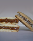 Traditional individual alfajor cut in half